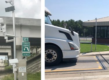 traffic camera and white truck on motor carrier on the road